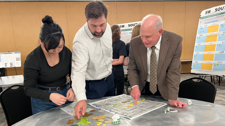 Individuals engaging in public engagement activities in Sterling Heights, Michigan